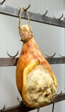 Single parma or prosciutto ham in a butchery Stock Photos