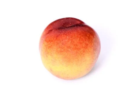 Single peach on white background Foto stock