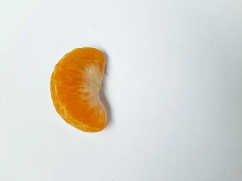 Single Peeled Orange Segment Top View Fotos de archivo