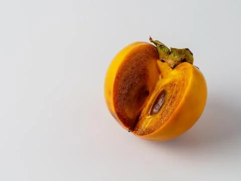 Single persimmon isolated on white background. Foto stock