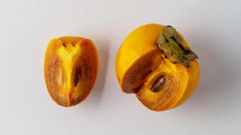 Single persimmon isolated on white background. Foto stock
