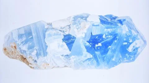 A single piece of raw celestite with pale blue color and crystal clusters, .. Stock Photos