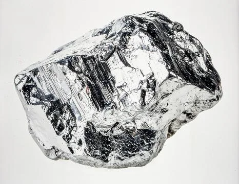 A single piece of raw silver ore with metallic luster and crystalline struc.. Stock Photos