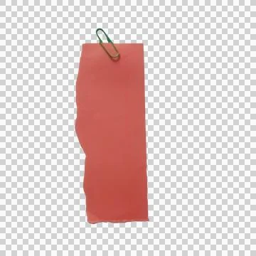 A single piece of torn red paper with a green metal paper clip attached to .. Stock Photos