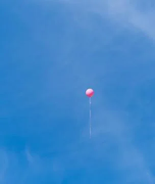 Single pink balloon Stock Photos