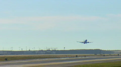 Single plane taking off at LAX Stock Footage 740385