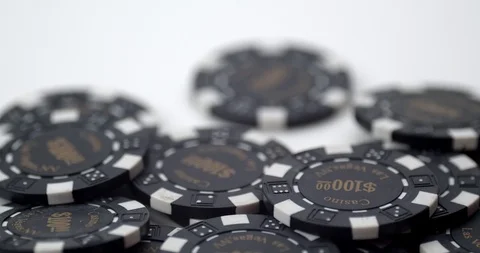 Single poker chip added to pile of chips Stock Footage 112329649