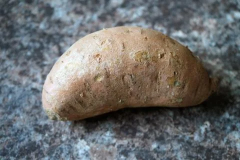 Single potato in a kitchen Stock Photos