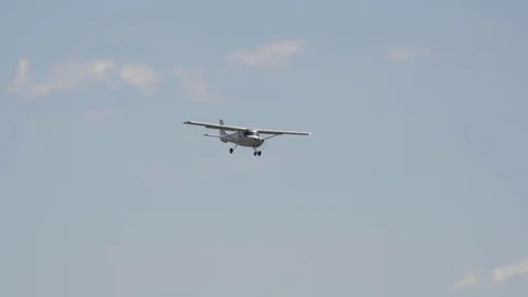 Single prop plane approaches for landing Stock Footage 79464356