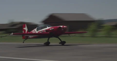 Single Prop Stunt Plane Quick Takeoff Stock Footage 221271399
