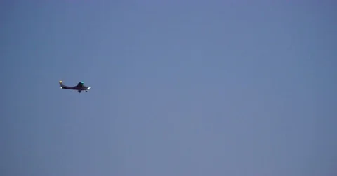 Single propeller airplane over LA, California Stock Footage 81552994