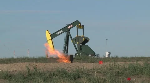 Single Pumping Unit With Gas Flare Low Angle Stock Footage 43068825