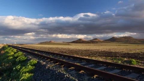 Single railway track at sunset Stock Footage 104037850