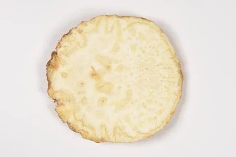 Single Raw Celery Root Slice Isolated on White Background Stock Photos