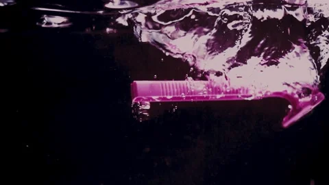 Single Razer Drops in Water Stock Footage 300884679