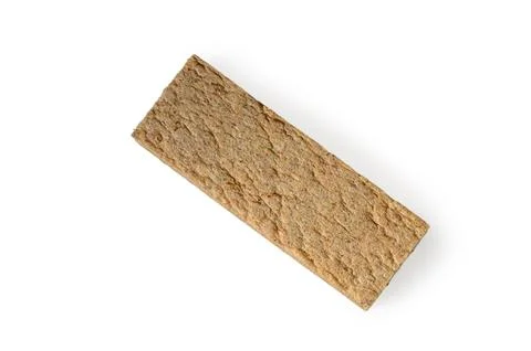 Single rectangular whole grain crispbread on a white background Foto stock