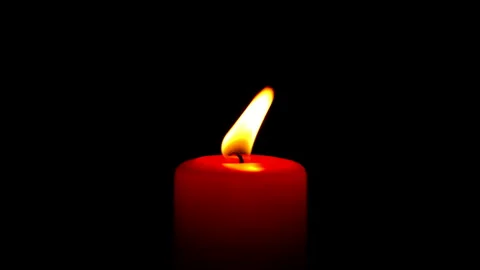 Single red candle flame lights, isolated on a black background Stock-Footage 239810476