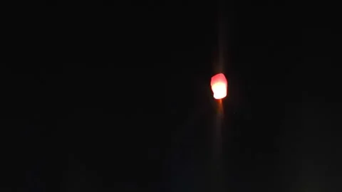 Single Red Chinese Sky Lantern Floating In Dark Night Sky Stock Footage 333576416