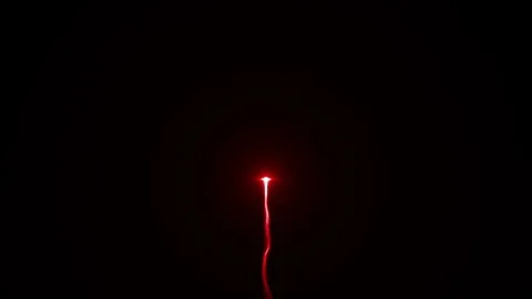 Single Red firework on dark background Stock Footage 81475299