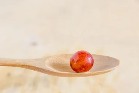 Single red grape Stock Photos