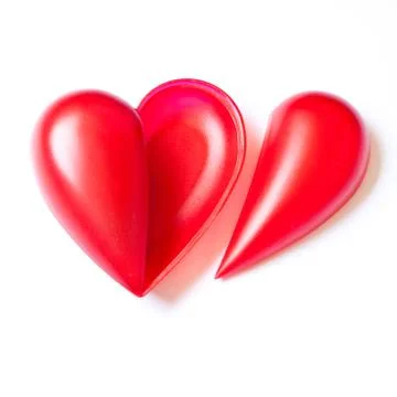 Single red hearts on white background Stock Photos