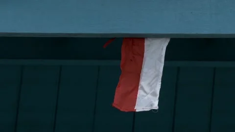 Single red white Indonesia flag pennants hanging as decoration Stock Footage 137075654