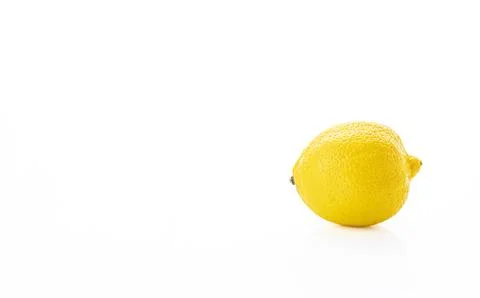 Single ripe lemon on white background.  Perfect for healthy recipes, refres.. Stock Photos