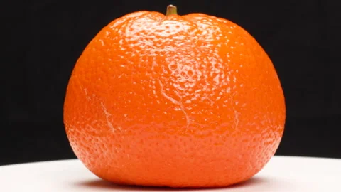 Single Ripe Orange Rotating on Black Background Studio Shot 4K Stock Footage 319451771