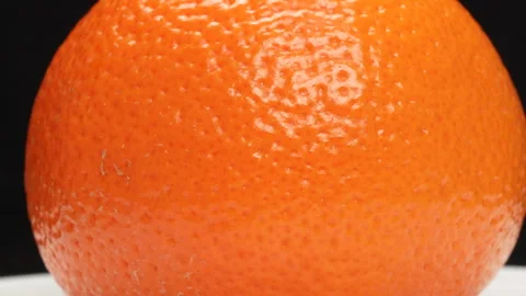 Single Ripe Orange Rotating on White Background Studio Shot 4K Stock Footage 319451798