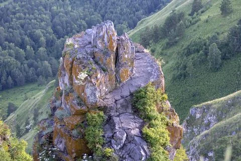 Single rock with a wide path to the top. Mountain Altai Stock Photos