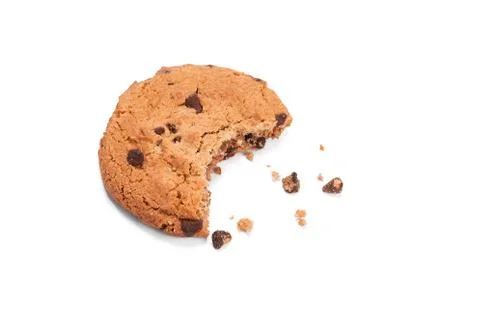 Single round chocolate chip biscuit with crumbs and bite missing, isolated on Stock Photos