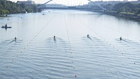Single scull racers compete on the World Rowing Cup course in Seville Stockbeeldmateriaal 336098899