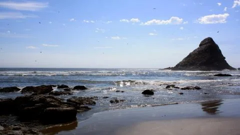 Single sea stack Stock Photos