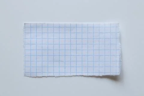 A single sheet of paper, a torn rectangular sheet of white paper in a blue .. Stockfoto's