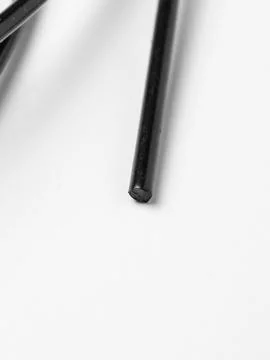 Single short black cord studio shot Stock Photos