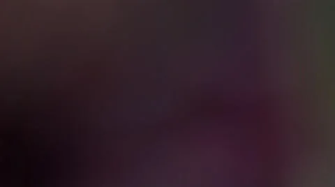 Single silver drop falling in ultra-slow motion from top of purple background Stock Footage 59527634