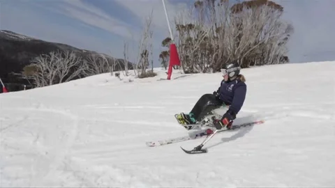 Single Ski with a Chair riding down the slope Stock Footage 81498593