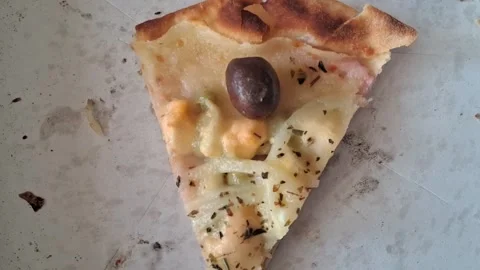 Single slice of delicious melted cheese pizza video motion clip Stock Footage 337896971