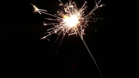 Single sparkler burning at black background isolated Stock Footage 132127812