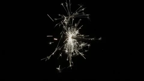 A single sparkler in the dark later joined by another one Stock Footage 151417501