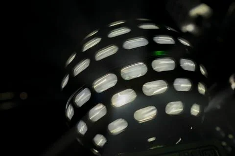 Single spinning disco light ball Stock Photos