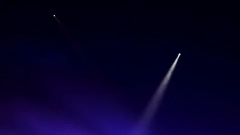 Single spotlight beam in dark stage haze Stock Footage 337800501