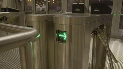 Single stadium turnstile gate showing controlled entry system and security Stock Footage 326839428