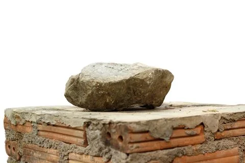A single stone isolated on white background with clipping path. Stock Photos