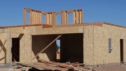 Single Story Pullback New Housing Construction Daytime Blue Sky Stock Footage 95965388