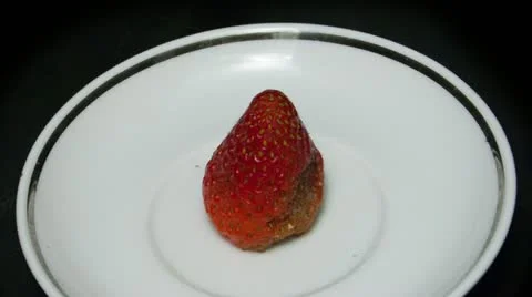 Single strawberry top view Stock Footage 21881309