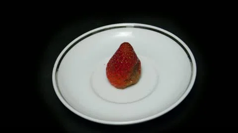 Single strawberry top view wide Stock Footage 21881284