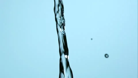 Single Stream Of Crystal Clear Water Breaking Into A Splash Of Droplets Stock Footage 326291863