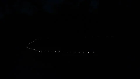 Single string of light flashing in the compete darkness Stock Footage 244142246