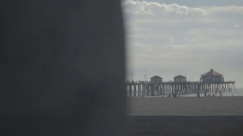 Single Surfer Running with Surfboard To Go Surfing - Huntington Beach Stock Footage 74721331